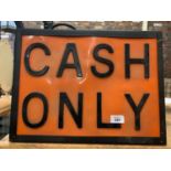 AN ILLUMINATED 'CASH ONLY' SIGN