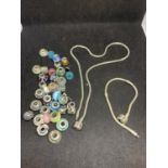 A PANDORA BRACELET AND A PANDORA STYLE NECKLACE WITH A LARGE QUANTITY OF VARIOUS CHARMS