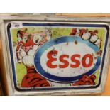 A VINTAGE STYLE METAL FRAMED 'ESSO TIGER' COMIC WALL ART PICTURE 44CMS X 34CMS