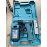 A MAKITA 9.6V BATTERY POWERED DRILL