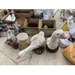 A LARGE COLLECTION OF STONE EFFECT GARDEN ORNAMENTS TO INCLUDE A PAIR OF GEESE, TWO PLANTERS AND A