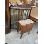 A SHINY WALNUT DISPLAY CABINET AND DROP-LEAF TABLE