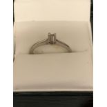 A PLATINUM EMERALD CUT DIAMOND SOLITAIRE RING 0.43 CARAT CLARITY: VS1 COLOUR: K SIZE: O