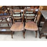 A PAIR OF VICTORIAN ELM SEATED ROPE-BACK KITCHEN CHAIRS