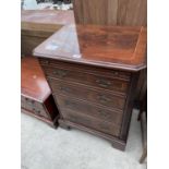 AN ANTIQUE STYLE CROSSBANDED MAHOGANY STEREO CABINET IN THE FORM OF A CHEST OF DRAWERS