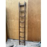 A VINTAGE WOODEN EXTENDABLE LADDER