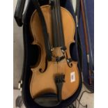 A HALF CASE VIOLIN TO INCLUDE CHIN REST AND BOW