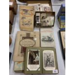 A SELECTION OF VINTAGE CIGARETTE CARDS AND POSTCARDS
