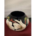 A MOORCROFT VASE FOUR INCHES HIGH