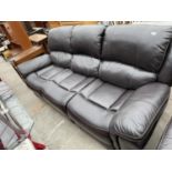 A MODERN THREE SEATER SETTEE WITH END RECLINERS