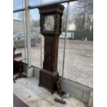 AN 18TH CENTURY OAK LONGCASE CLOCK BY WM BARNIFH, ROCHDALE, WITH BRASS DIAL, HEAVILY CARVED