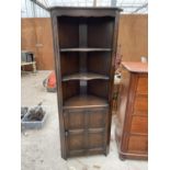 AN OAK 'OLD CHARM' STYLE CORNER UNIT