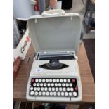 A SMITH-CORONA DELUXE TYPEWRITER