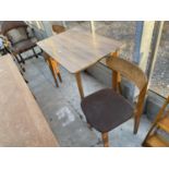 A FORMICA TOP KITCHEN TABLE AND TWO CHAIRS