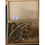 A CIGAR BOX OF MIXED COSTUME JEWELLERY