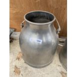 A STAINLESS STEEL MILKING BUCKET