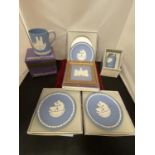 SIX PIECES OF JASPERWARE TO INCLUDE THREE PLATES, A FRAMED PLAQUE, A TANKARD AND A LIGHTER (ALL