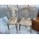 A PAIR OF VICTORIAN KITCHEN CHAIRS