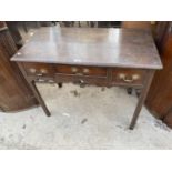 A GEORGE III OAK LOWBOY ENCLOSING THREE DRAWERS AND CARVED RAIL, 35" WIDE