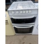 A WHITE CANNON ELECTRIC AND GAS COOKER