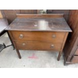 AN EARLY 20TH CENTURY OAK CHEST OF TWO DRAWERS