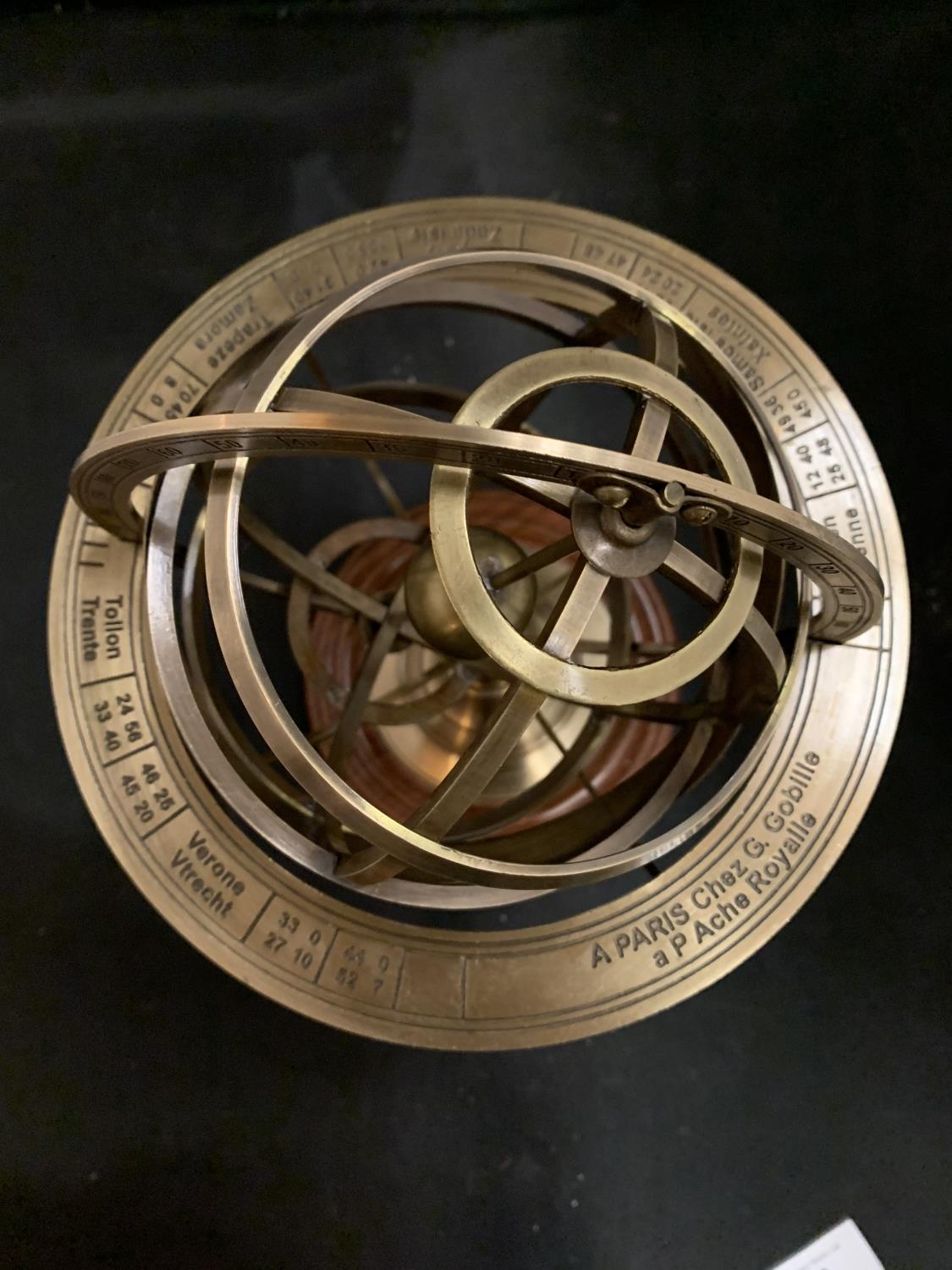 A BRASS ARMILLARY SHPERE ON A WOODEN BASE - Image 2 of 3