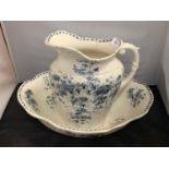 A VINTAGE 'CRYSANTHEMUM' BLUE AND WHITE WASH JUG AND BOWL (RIM A/F)