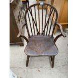 AN ELM SEATED WINDSOR ARMCHAIR, STAMPED W ON THE BACK