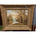 A SMALL GILT FRAMED OIL ON BOARD