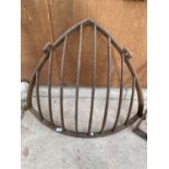 A VINTAGE CAST IRON CORNER HAY RACK