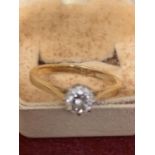 AN 18 CARAT YELLOW GOLD RING WITH A SOLITAIRE DIAMOND BELIEVED 0.5 - 0.65 CARAT SIZE N/O GROSS