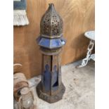 A VINATGE GARDEN DECORATIVE LANTERN CONVERTED IN TO A LAMP