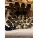 A LARGE QUANTITY OF VINTAGE EARTHENWARE JARS AND BOTTLES