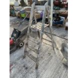 A PAIR OF VINTAGE 3 RUNG SMALL WOODEN STEP LADDERS