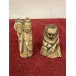 A PAIR OF 19TH CENTURY JAPANESE NETSUKE NAIVE CARVED BONE FIGURES