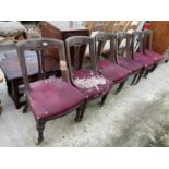 A SET OF SIX VICTORIAN MAHOGANY DINING CHAIRS WITH TURNED AND PARTIALLY FLUTED FRONT LEGS AND