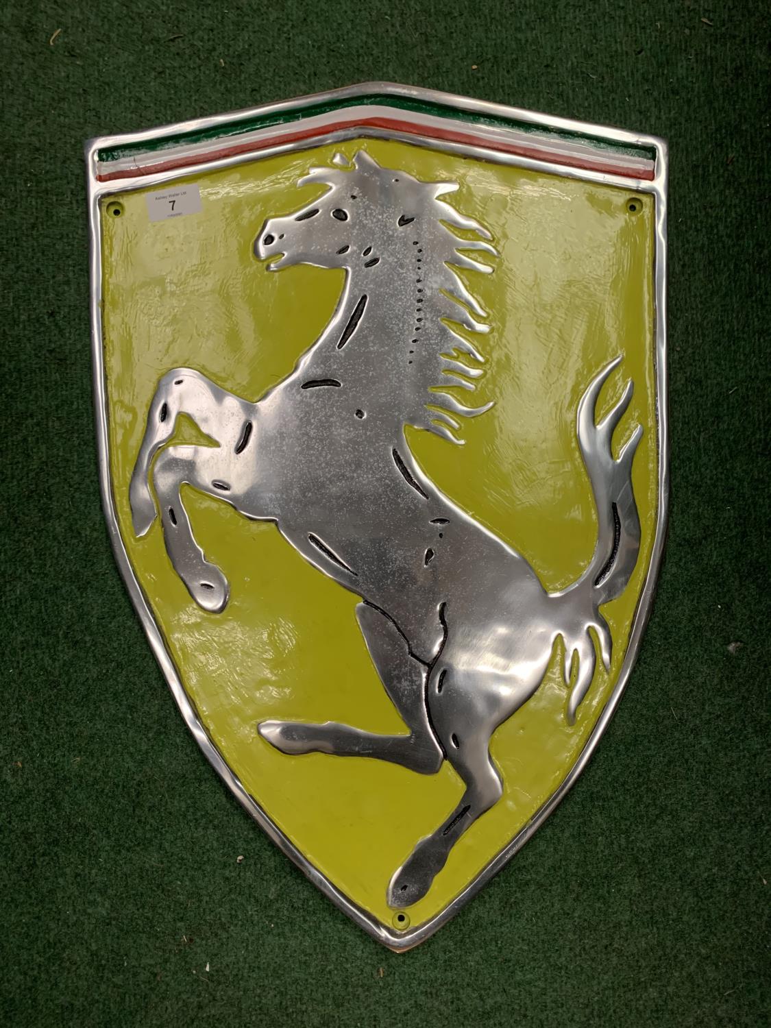 A LARGE CHROME PAINTED FERRARI SIGN (H: 60CM)