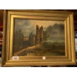 A GILT FRAMED OIL ON BOARD DEPICTING A CASTLE SIGNED J HOLT