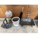 AN ASSORTMENT OF ITEMS TO INCLUDE A METAL LOG BASKET, VINTAGE OIL LAMP AND PLANT POT ETC