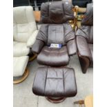 A STRESSLESS BROWN LEATHER RECLINING ARMCHAIR AND FOOTSTOOL