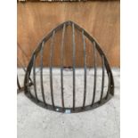 A VINTAGE CAST IRON CORNER HAY RACK