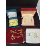 THREE 9 CARAT GOLD ITEMS TO INCLUDE A PAIR OF HOOP EARRINGS, CROSS EARRINGS AND A HEART PENDANT WITH