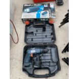 A BLACK AND DECKER BATTERY DRILL AND A FURTHER BLACK AND DECKER HEAT GUN