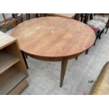 A RETRO TEAK CIRCULAR EXTENDING DINING TABLE, 44" DIAMETER