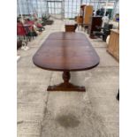 AN OAK TWIN PEDESTAL EXTENDING DINING TABLE, 68x36" (LEAF 17")