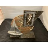 A BATTERY OPERATED MARBLE MANTLE CLOCK IN AN ART DECO STYLE WITH CHROME YACHT DETAIL