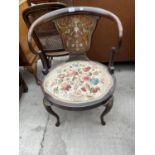 AN EDWARDIAN MAHOGANY AND PROFUSELY INLAID BEDROOM CHAIR ON CABRIOLE LEGS