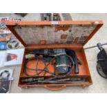 A METABO S-AUTOMATIC JACK HAMMER WITH DRILL BITS AND 110V PLUG BELIEVED IN WORKING ORDER BUT NO