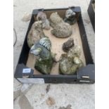 AN ASSORTMENT OF EIGHT STONE EFFECT GARDEN ORNAMENTS TO INCLUDE A FROG, SQUIRREL AND MOLE ETC