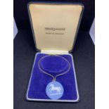 A WEDGEWOOD BLUE JASPERWARE PENDANT IN A PRESENTATION BOX